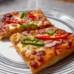 Air Fryer Pizza Toast topped with cheese and pepperoni, ready to serve.