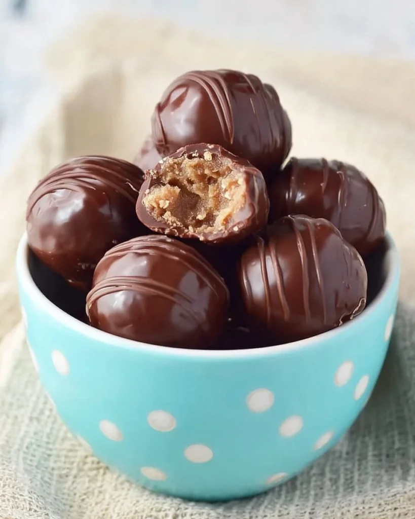 Delicious Amaretto Pecan Cookie Dough Truffles on a plate