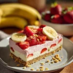 Delicious Banana-Strawberry Cheesecake topped with fresh fruits