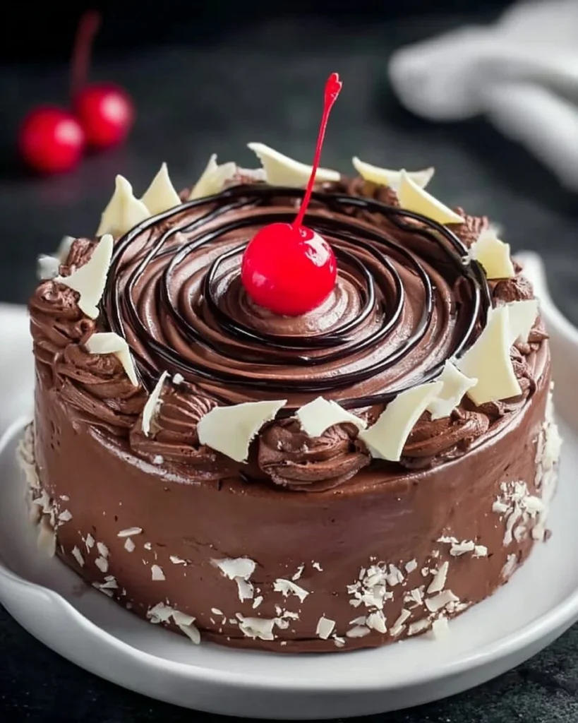 Delicious Cherry Chocolate Ice Cream Cake layered with cherries and chocolate ice cream