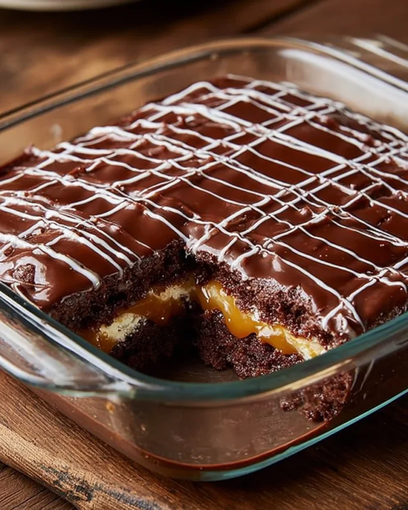 Delicious chocolate dulce de leche dessert topped with smooth ganache.