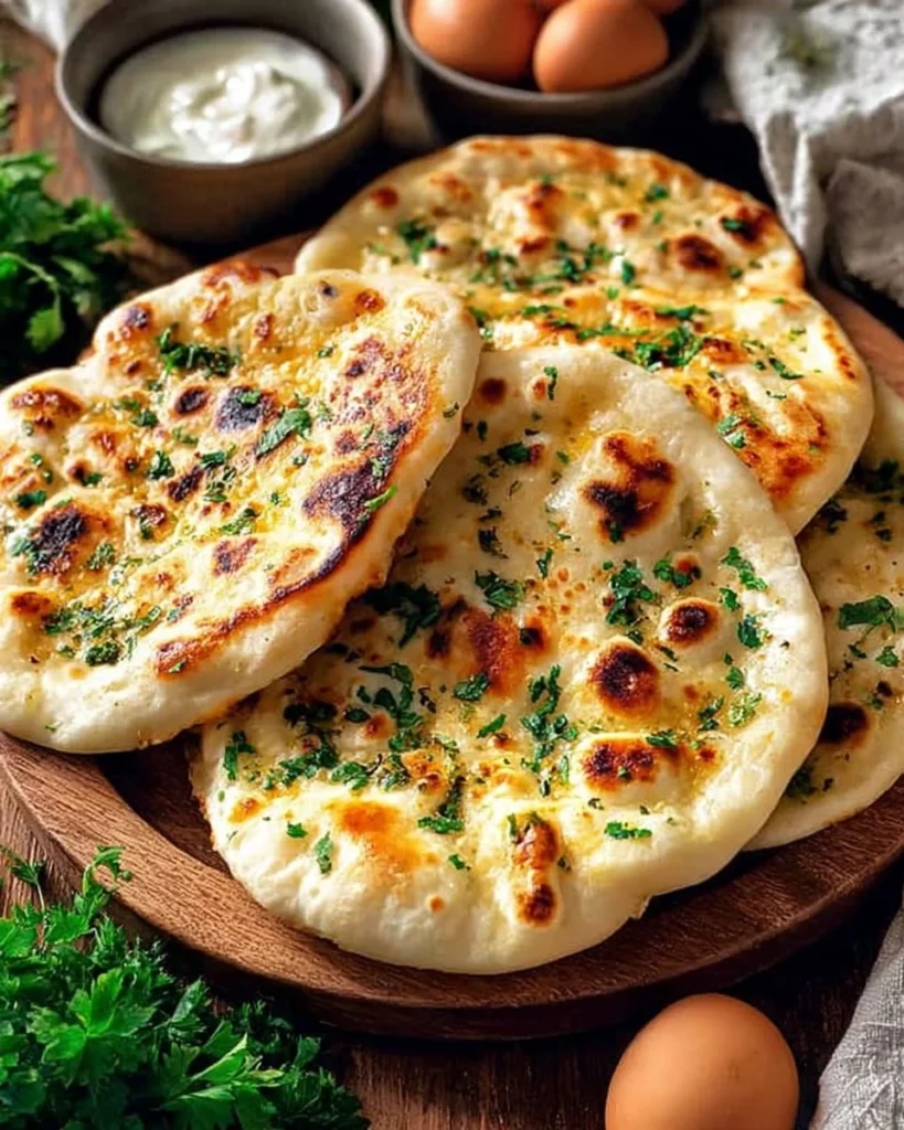 Homemade cottage cheese flat bread served on a wooden board