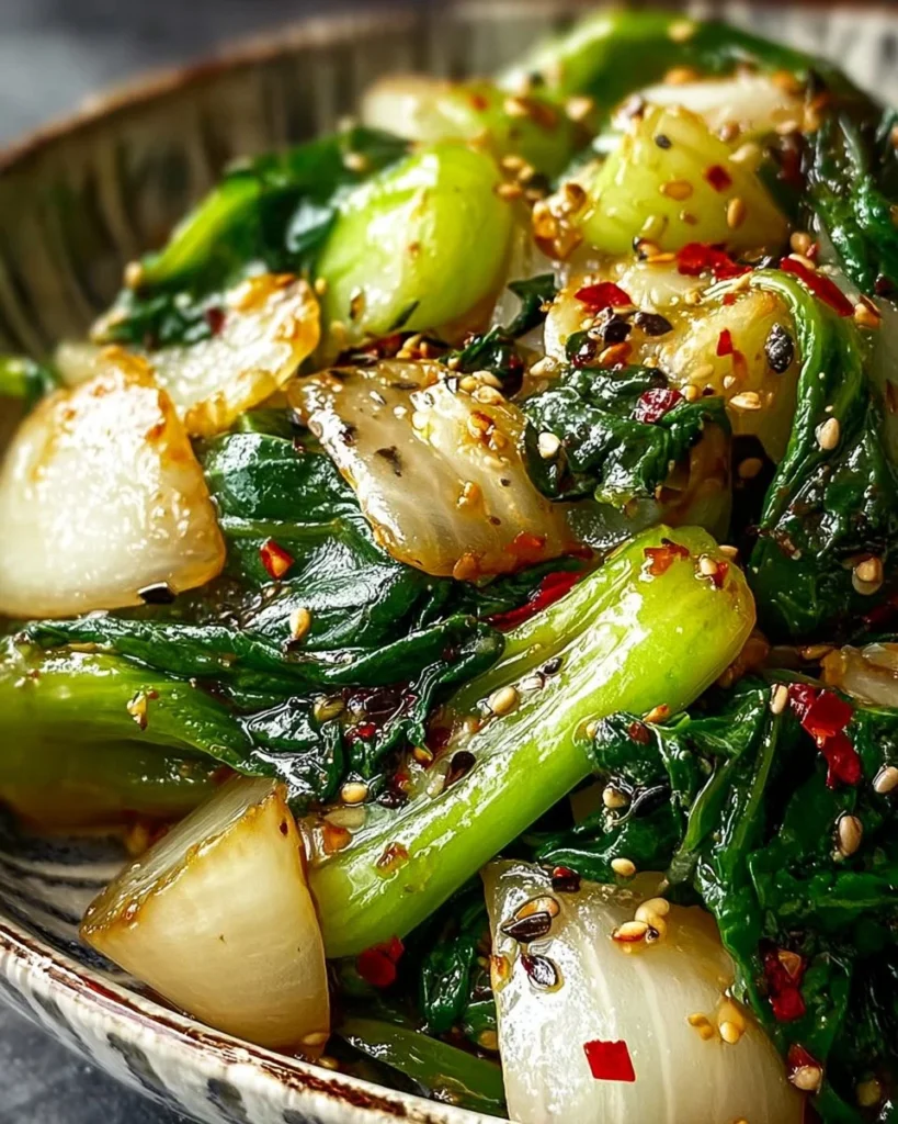 Delicious Garlic Ginger Bok Choy Stir-Fry served in a bowl with vibrant vegetables.