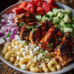 Grilled chicken with strawberry balsamic glaze served alongside feta ditalini pasta salad