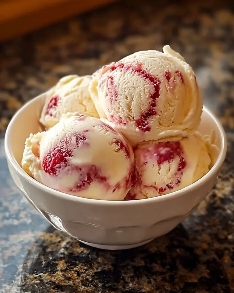 Delicious homemade strawberry vanilla bean ice cream in a bowl