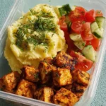 Meal prep chicken served with creamy mash and fresh vegetables for a balanced meal