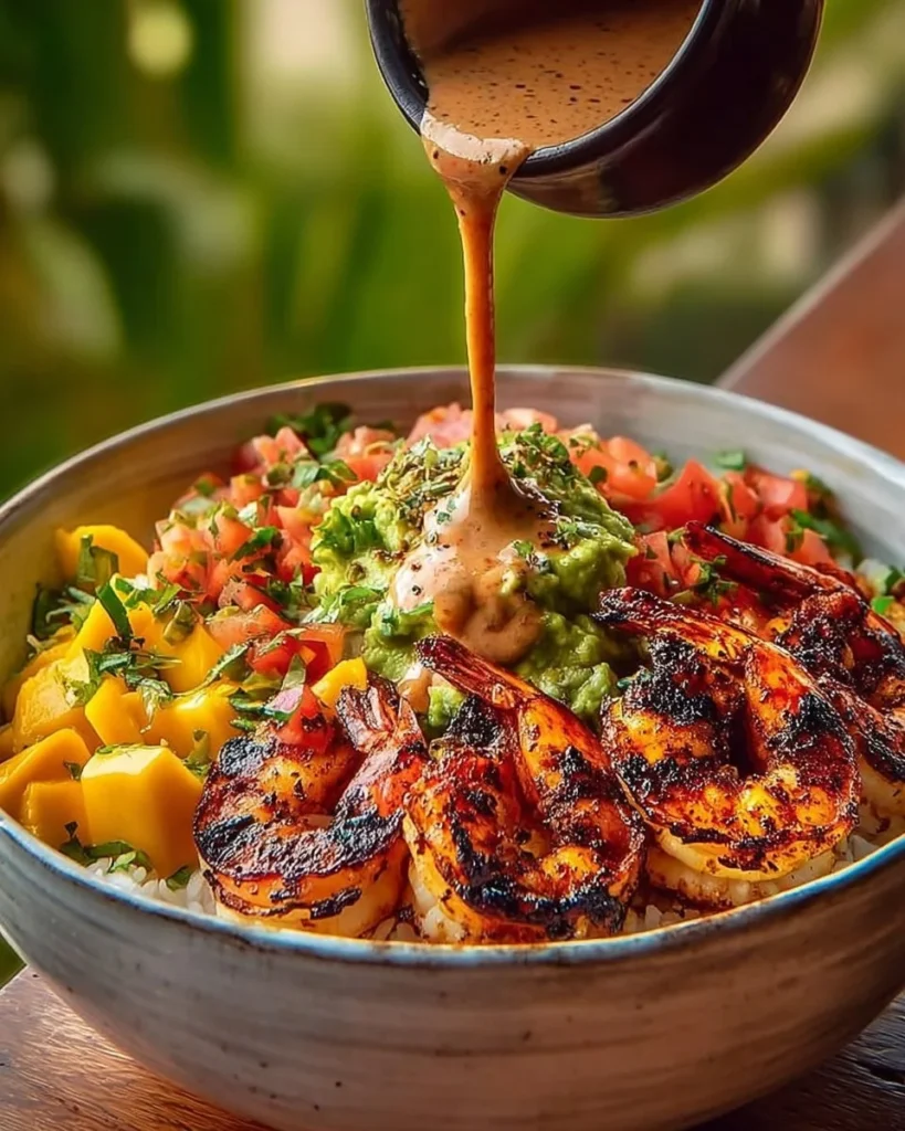 Mediterranean shrimp avocado bowls with mango-cucumber salsa and lemon-herb sauce