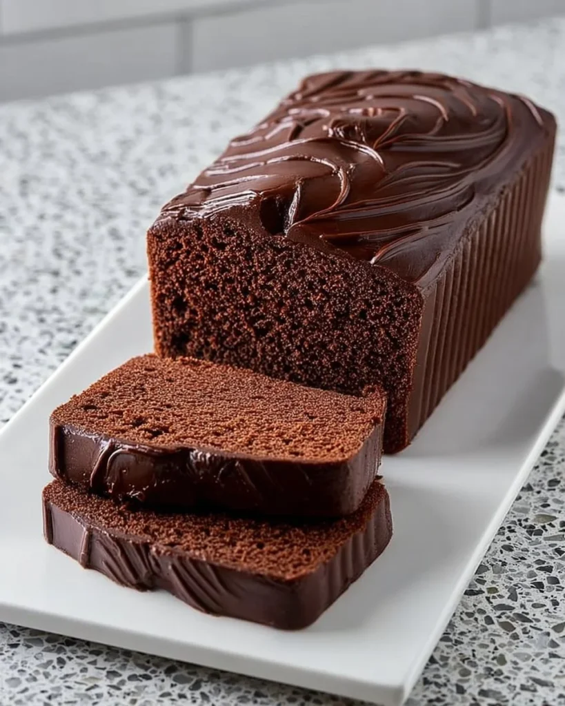 Moist chocolate sponge cake layered with chocolate frosting