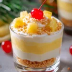 Delicious Pina Colada Cheesecake Mousse topped with coconut and pineapple