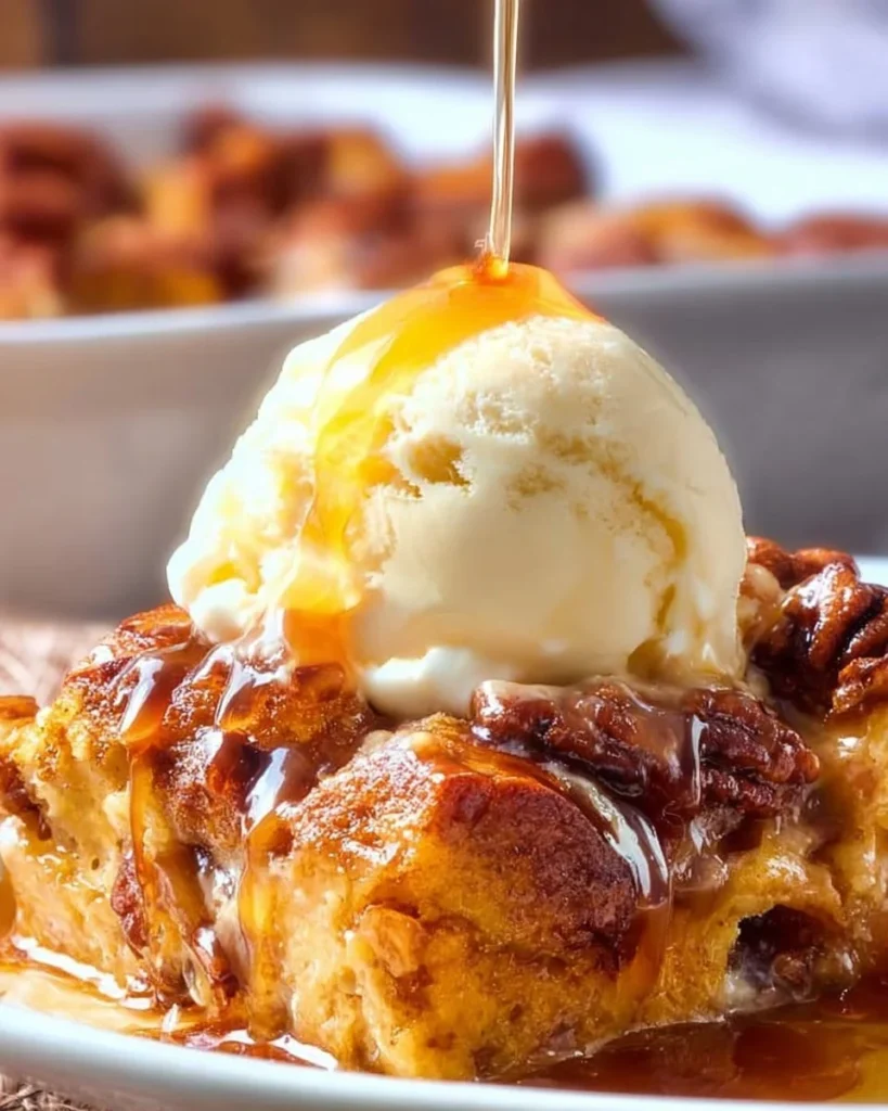 Deliciously baked Pumpkin Pecan Bread Pudding with a golden crust and pecan topping
