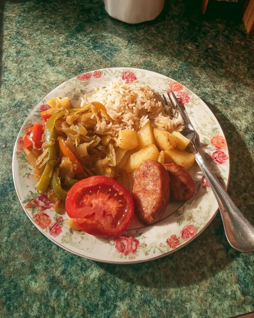 Plate of smoked sausage with fried potatoes and green beans