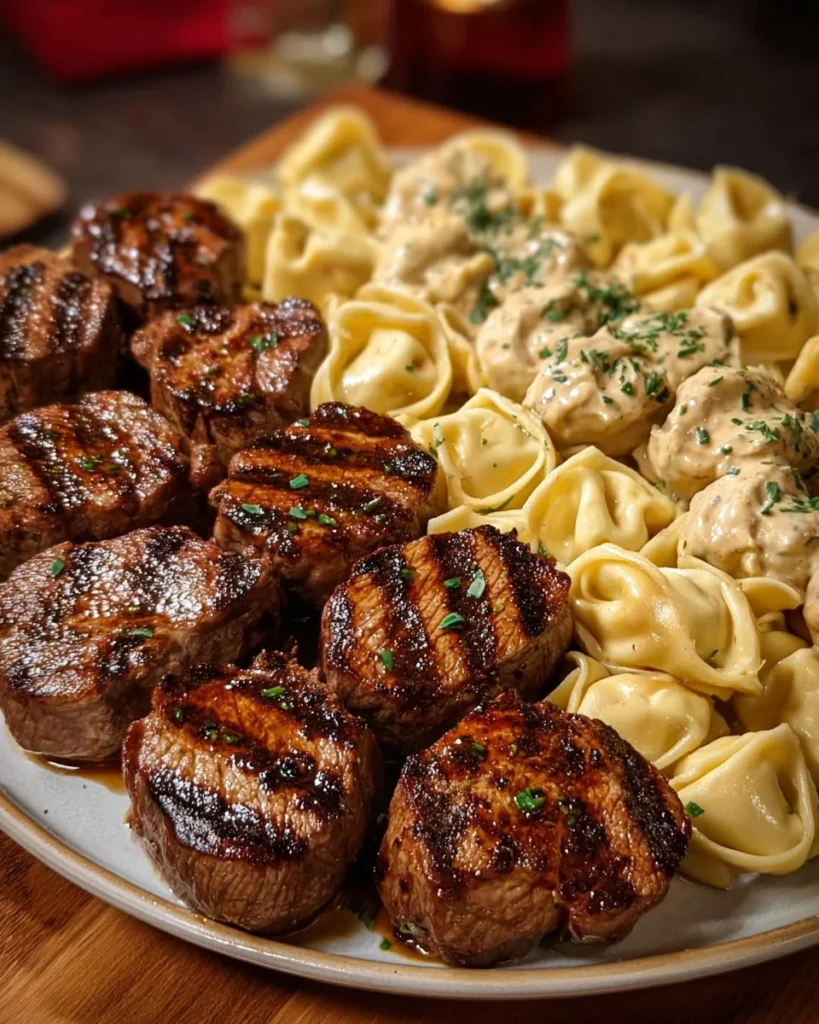 Delicious Garlic Butter Steak served with cheesy Alfredo tortellini