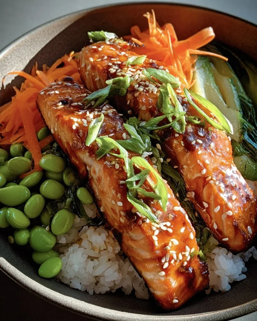 Delicious teriyaki salmon bowl with colorful vegetables and rice
