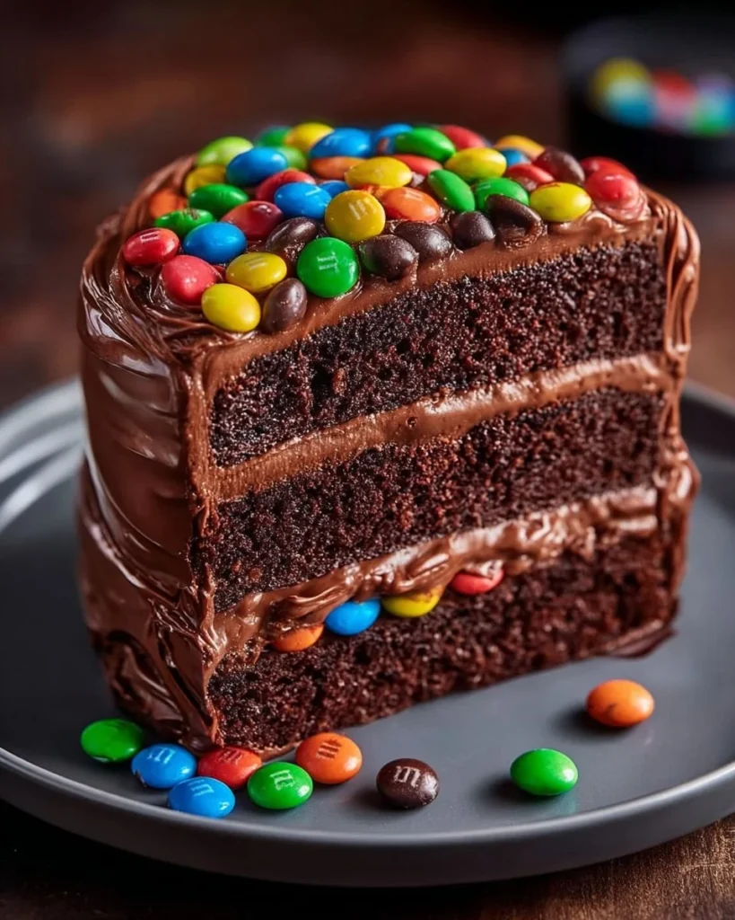 Ultimate Chocolate M&M Celebration Cake with colorful candies and rich frosting